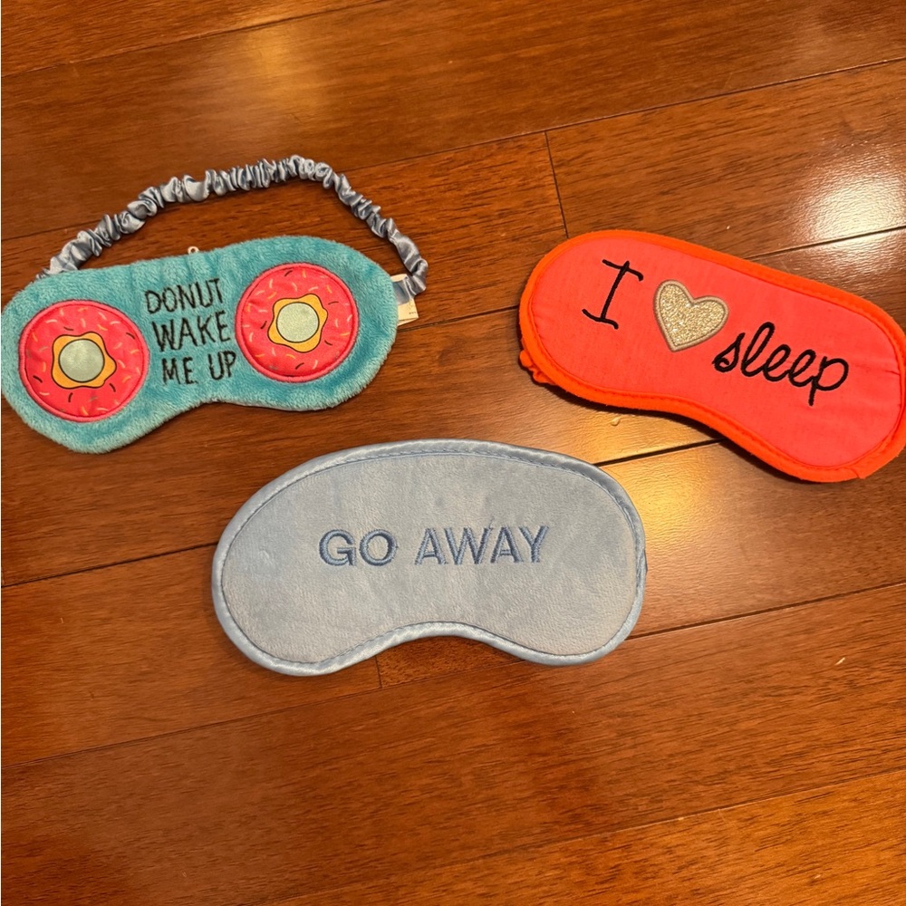 Set of Three Sleep Masks in Blue, Orange, and Silver